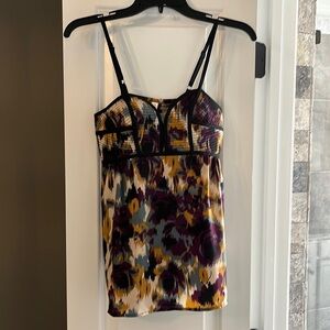 Multicolored tank with black piping
